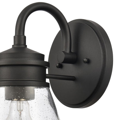 Atlas Lighting Dovas 11.5in 1-Light Outdoor Sconce | Transitional Textured Black and Clear Seeded Glass | Porch & Entryway | Model OL11127-BK