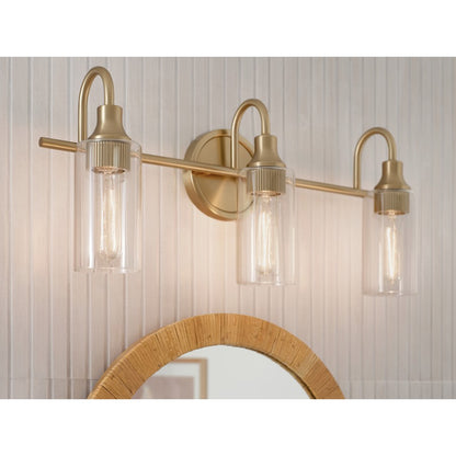 Kichler Kavi 23in 3-Light Vanity Light | Modern Champagne Bronze Steel & Clear Glass | Bathroom Vanity Lighting | Dimmable | Model 55211CPZ