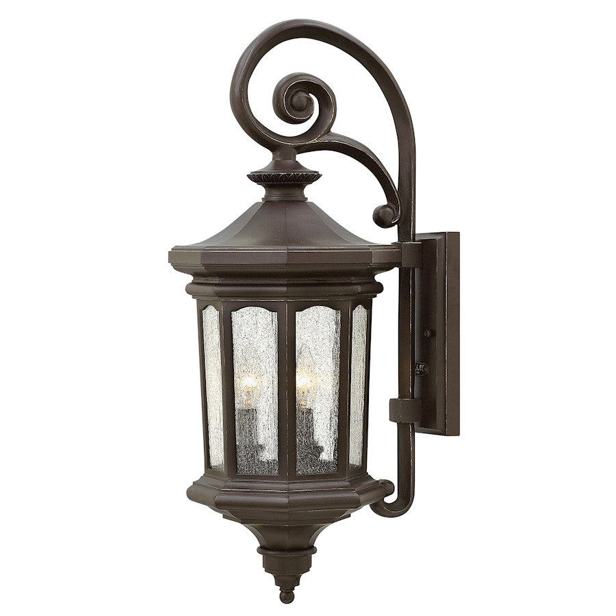 Hinkley Outdoor Raley 25.75in 3-Light Outdoor Sconce | Transitional Oil Rubbed Bronze Cast Aluminum and Clear Seedy Glass | Covered | Model 1604OZ-LL