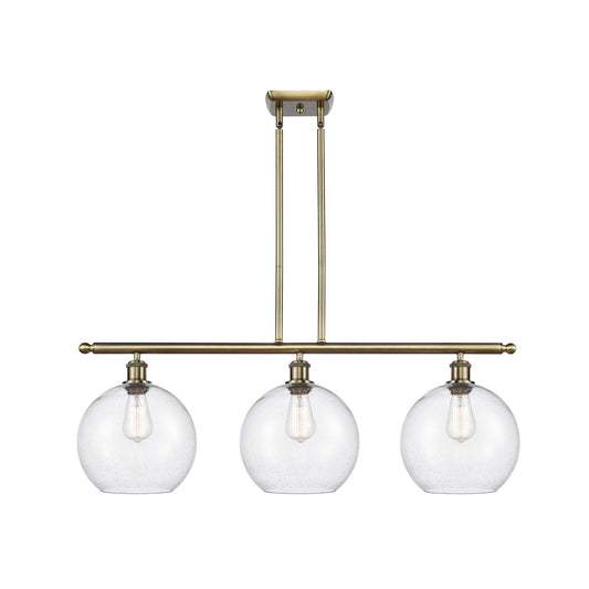 Innovations Athens 36in 3-Light Island | Industrial Antique Brass and Seedy Glass | Kitchen Island & Dining Room | Model 516-3I-AB-G124-10