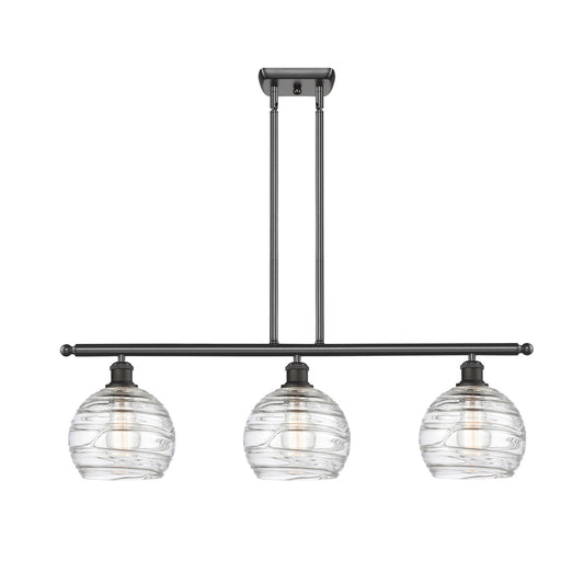 Innovations Athens Deco Swirl 36in 3-Light Island Light | Industrial Oil Rubbed Bronze Steel and Clear Deco Swirl Glass | Model 516-3I-OB-G1213-8CL