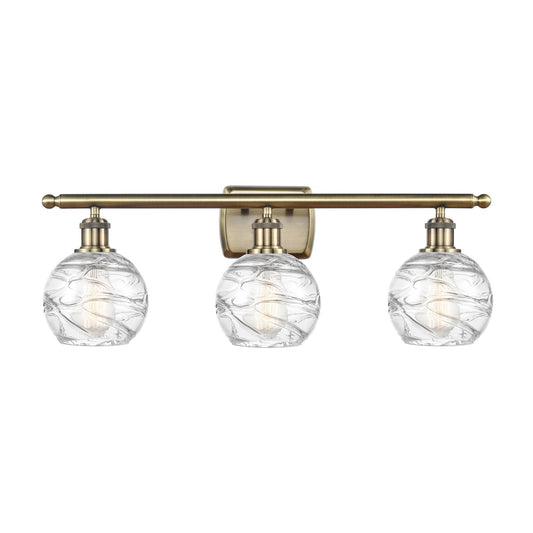 Innovations Athens Deco Swirl 3Lt 25.875", Antique Brass