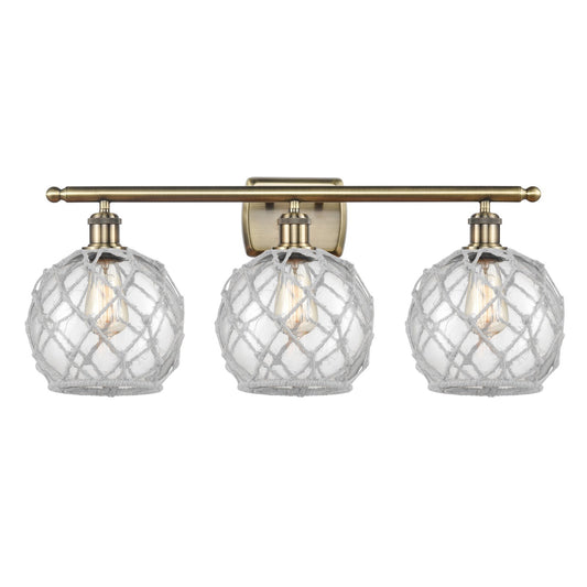 Innovations Farmhouse Rope 28in 3-Light Bath Vanity | Industrial Antique Brass Steel and Clear Glass with White Rope | Bathroom | Model 516-3W-AB-G122-8RW