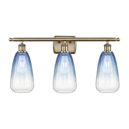 Innovations Brookhaven Almond 26in 3-Light Bath Vanity Light | Industrial Antique Brass Steel and Sapphire Blue Glass | Model 516-3W-AB-G480-6SB