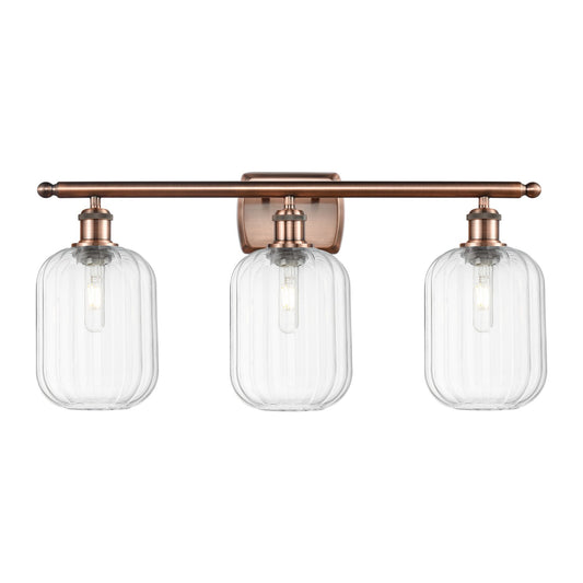 Innovations Preston Cylinder 27in 3-Light Bath Vanity Light | Industrial Antique Copper Steel and Clear Glass | Bathroom Vanity | Model 516-3W-AC-G460-7CL