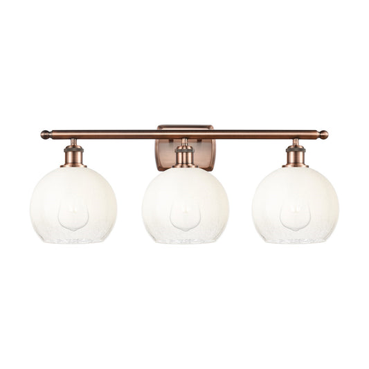 Innovations Brookhaven Globe 28in 3-Light Bathroom Vanity Light | Industrial Antique Copper Steel and Opal Glass | Damp Rated | Model 516-3W-AC-G483-8OP
