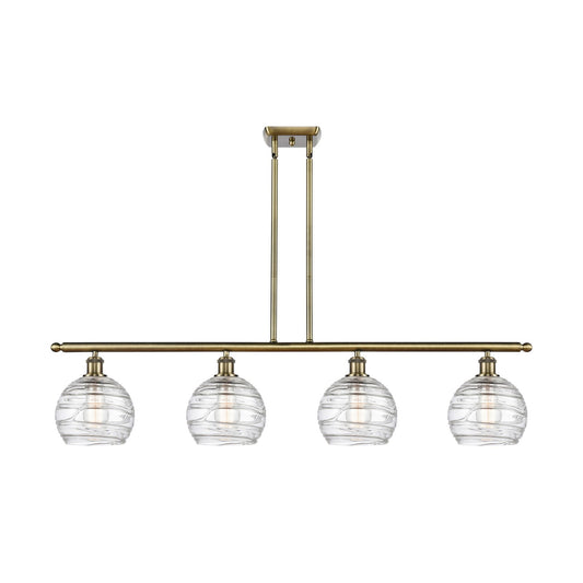 Innovations Athens Deco Swirl 48in 4-Light Island Light | Industrial Antique Brass and Clear Deco Swirl Glass | Kitchen Island | Model 516-4I-AB-G1213-8CL