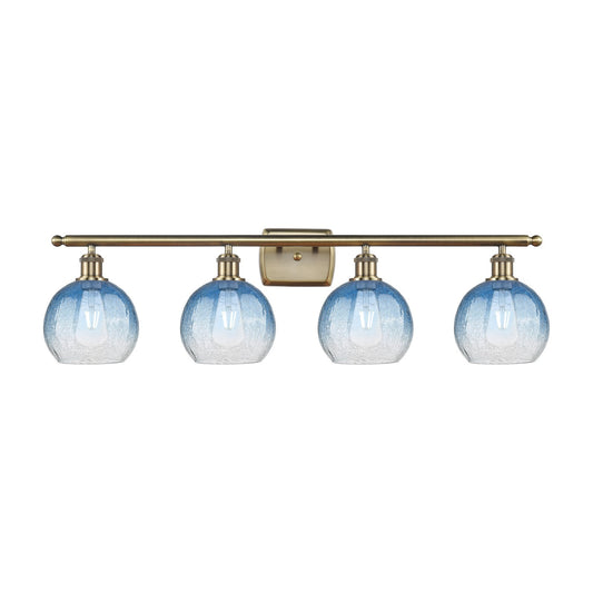 Innovations Brookhaven Globe 38in 4-Light Bath Vanity Light | Industrial Antique Brass Steel and Sapphire Blue Glass | Bathroom | Model 516-4W-AB-G483-8SB