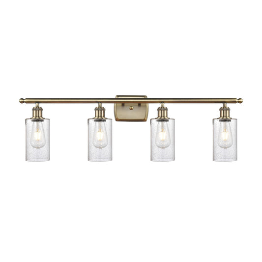 Innovations Clymer 34in 4-Light Bath Vanity Light | Art Nouveau Antique Brass Steel and Seedy Glass | Bathroom Vanity | 34 x 10 x 6 | Model 516-4W-AB-G804
