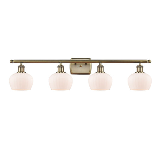 Innovations Fenton 36.5in 4-Light Bath Vanity Light | Industrial Antique Brass Steel and Matte White Ribbed Glass | Bathroom Vanity | Model 516-4W-AB-G91