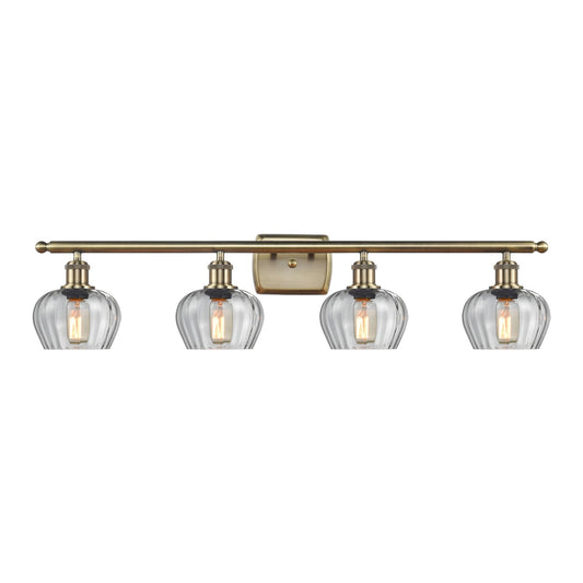 Innovations Fenton 37in 4-Light Bath Vanity Light | Industrial Antique Brass Steel and Clear Ribbed Glass | Bathroom Vanity | 36.5 x | Model 516-4W-AB-G92