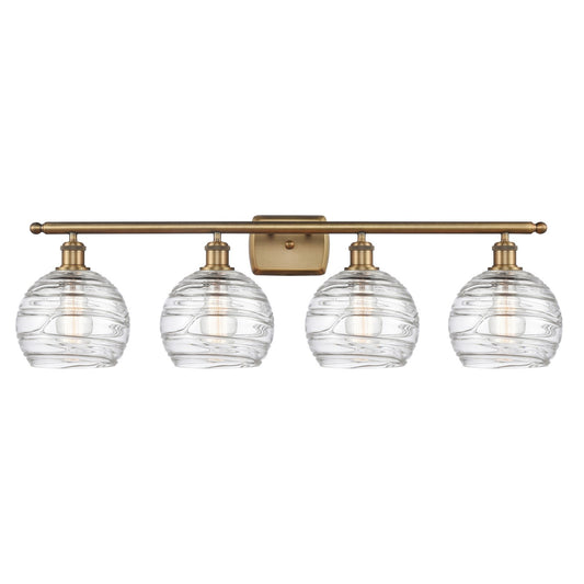 Innovations Athens Deco Swirl 38in 4-Light Bath Vanity Light | Industrial Brushed Brass and Clear Deco Swirl Glass | Bathroom | Model 516-4W-BB-G1213-8CL