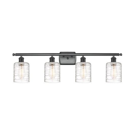 Innovations Cobbleskill 35in 4-Light Bath Vanity | Art Nouveau Industrial Matte Black Steel and Deco Swirl Clear Glass | Bathroom | Model 516-4W-BK-G1113