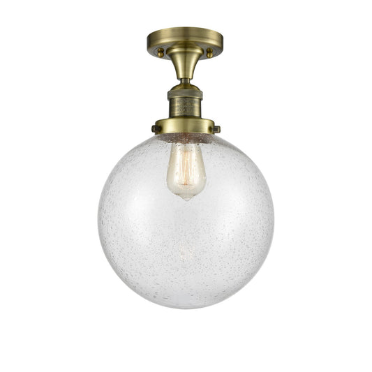 Innovations Beacon 10in 1-Light Semi-Flush Mount | Industrial Antique Brass Steel and Seedy Glass | Damp-Rated Entryway & | Model 517-1CH-AB-G204-10-LED