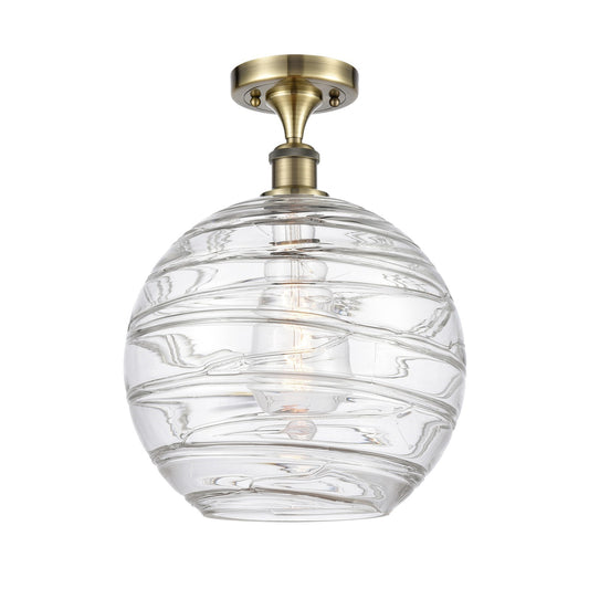 Innovations Athens Deco Swirl 12in 1-Light Semi-Flush Mount | Industrial Antique Brass and Clear Deco Swirl Glass | Damp | Model 616-1F-AB-G1213-12CL