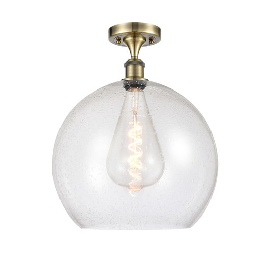 Innovations Athens 14in 1-Light Semi-Flush Mount | Industrial Antique Brass Steel and Seedy Glass Globe | Entryway & Hallway | Model 616-1F-AB-G124-14