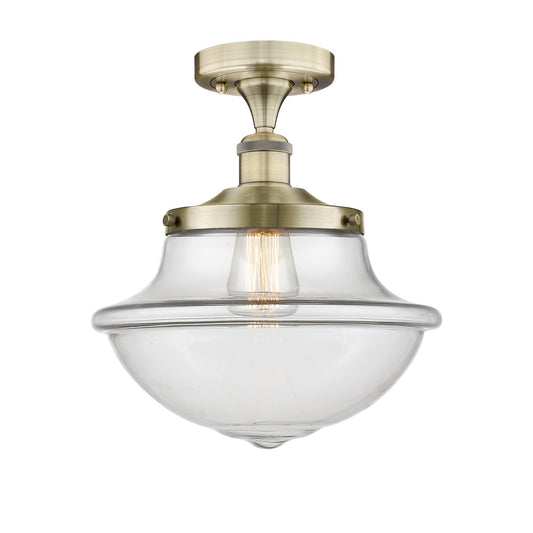 Innovations Oxford 12in 1-Light Semi-Flush Mount | Industrial Antique Brass and Clear Glass | Kitchen & Hallway | 11.75 x 13.12 in | Model 616-1F-AB-G542