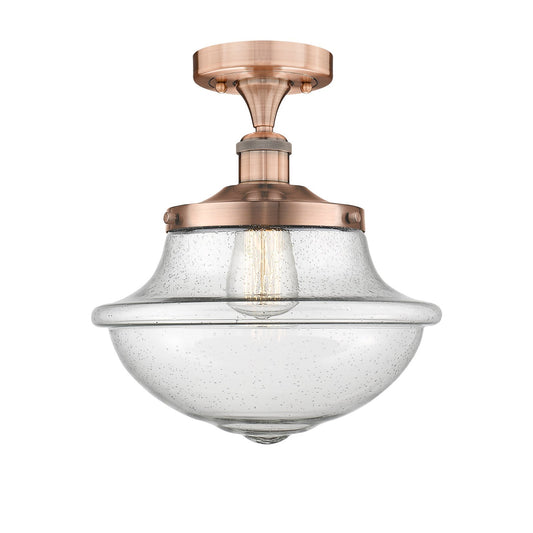 Innovations Oxford 12in 1-Light Semi-Flush Mount | Industrial Antique Copper Steel and Seedy Glass | Kitchen & Hallway | 11.75 x | Model 616-1F-AC-G544