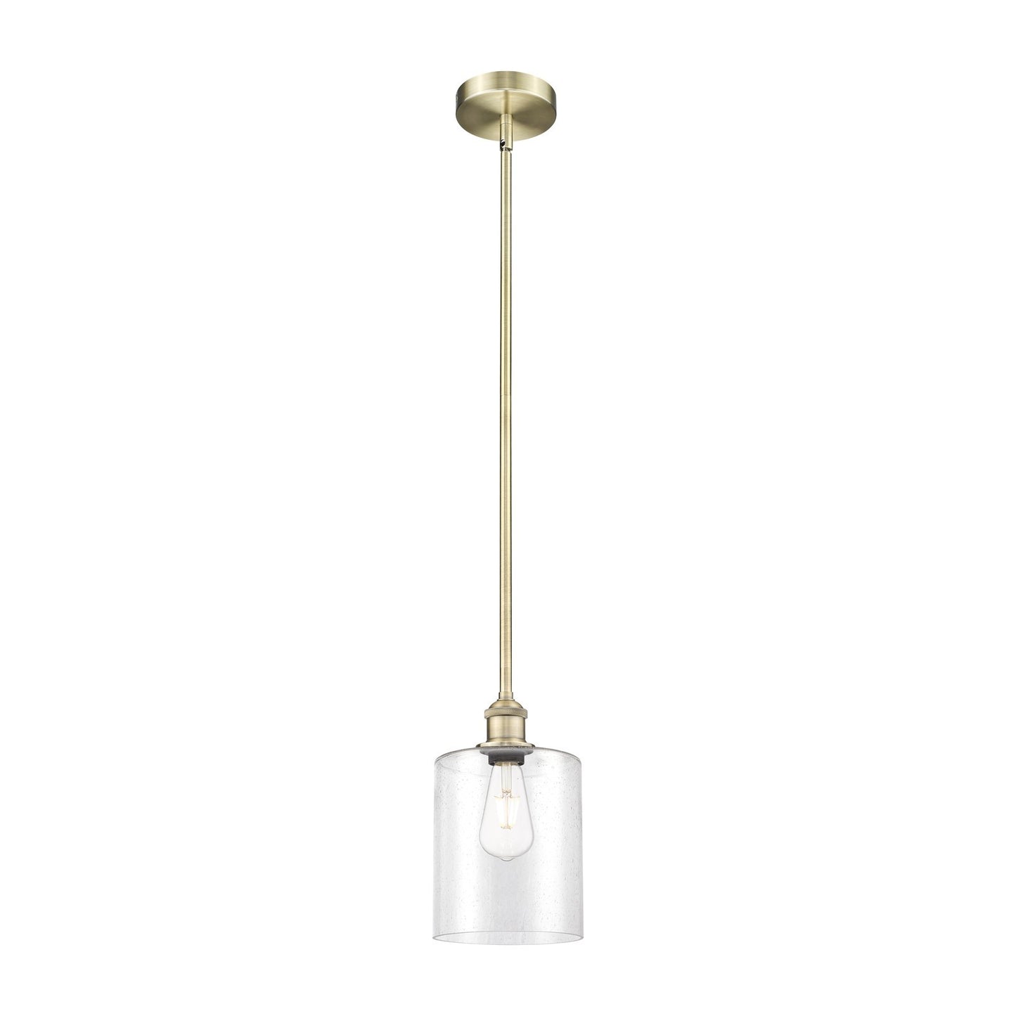 Innovations Paladin 7in 1-Light Mini Pendant | Farmhouse Antique Brass Steel and Seedy Glass Cylinder | Kitchen Island & Dining | Model 616-1S-AB-G4424-7