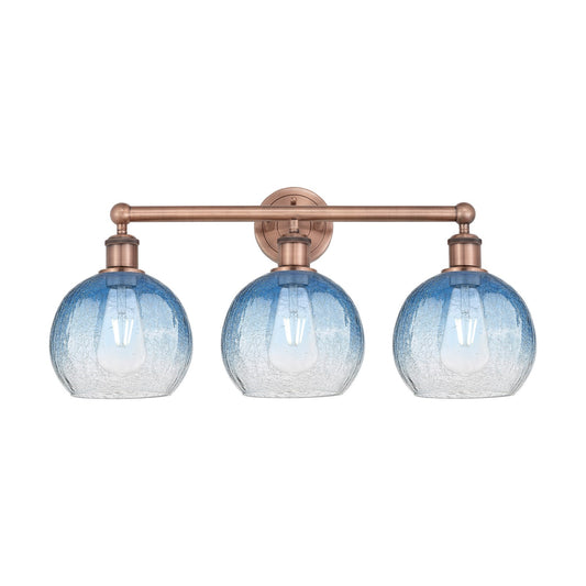 Innovations Brookhaven Globe 26in 3-Light Bath Vanity Light | Industrial Antique Copper and Sapphire Blue Glass | Damp Rated | Model 616-3W-AC-G483-8SB