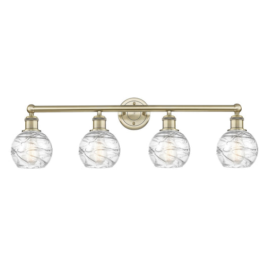 Innovations Athens Deco Swirl 33in 4-Light Bath Vanity Light | Industrial Antique Brass Steel and Clear Deco Swirl Glass | Model 616-4W-AB-G1213-6CL