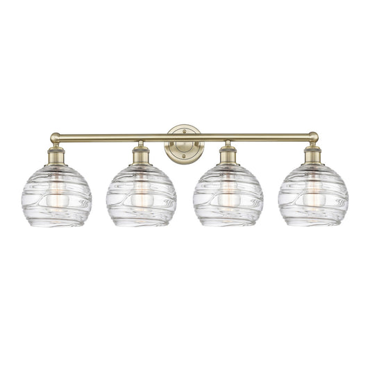 Innovations Athens Deco Swirl 35in 4-Light Bath Vanity | Industrial Antique Brass Steel and Clear Deco Swirl Glass | Bathroom | Model 616-4W-AB-G1213-8CL