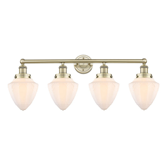 Innovations Bullet 34in 4-Light Bath Vanity Light | Industrial Antique Brass and Matte White Frosted Glass | Bathroom Vanity | 34 | Model 616-4W-AB-G661-7