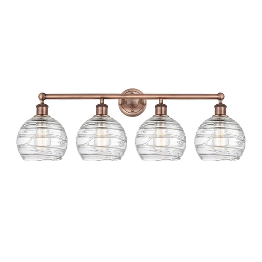 Innovations Athens Deco Swirl 35in 4-Light Bath Vanity Light | Industrial Antique Copper and Clear Deco Swirl Glass | Bathroom | Model 616-4W-AC-G1213-8CL
