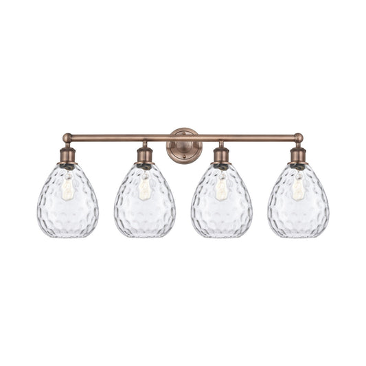Innovations Waverly 35in 4-Light Bath Vanity Light | Industrial Antique Copper Steel and Clear Glass | Damp Rated Bathroom Vanity | Model 616-4W-AC-G372
