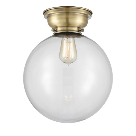Innovations Beacon 12in 1-Light Flush Mount | Industrial Antique Brass and Clear Glass | Bedroom & Hallway | 12 x 12 x 14.75 | Model 623-1F-AB-G202-12-LED