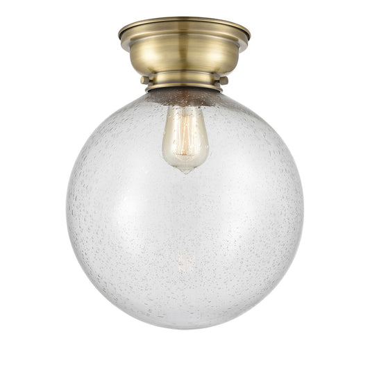 Innovations Beacon 12in 1-Light Flush Mount | Industrial Antique Brass Steel and Seedy Glass | Hallway & Bedroom | 12 x 12 x | Model 623-1F-AB-G204-12-LED