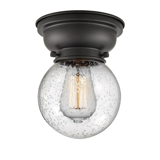 Innovations Beacon 6in 1-Light Flush Mount | Industrial Matte Black Steel and Seedy Glass | Bedroom & Hallway | 6 x 6 x 8.38 | Model 623-1F-BK-G204-6-LED