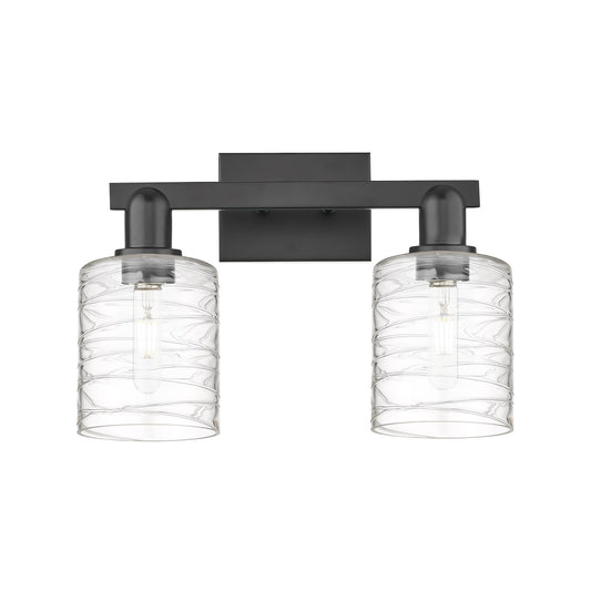 Innovations Cobbleskill 16in 2-Light Bath Vanity Light | Industrial Matte Black Steel and Deco Swirl Glass | Bathroom Vanity | 16 | Model 716-2W-BK-G1113