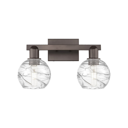 Innovations Athens Deco Swirl 16.88in 2-Light Bath Vanity Light | Industrial Oil Rubbed Bronze Steel and Clear Deco Swirl | Model 716-2W-OB-G1213-6CL