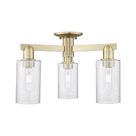 Innovations Clymer 21in 3-Light Semi-Flush Mount | Industrial Antique Brass Steel and Seedy Glass | Entryway & Hallway | 21.38 x | Model 716-3F-AB-G804