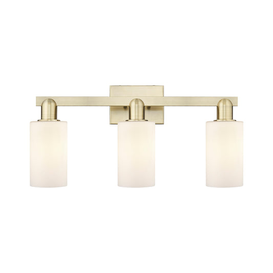 Innovations Clymer 23in 3-Light Bath Vanity Light | Industrial Antique Brass Steel and Matte White Glass | Bathroom Vanity | 22.88 | Model 716-3W-AB-G801