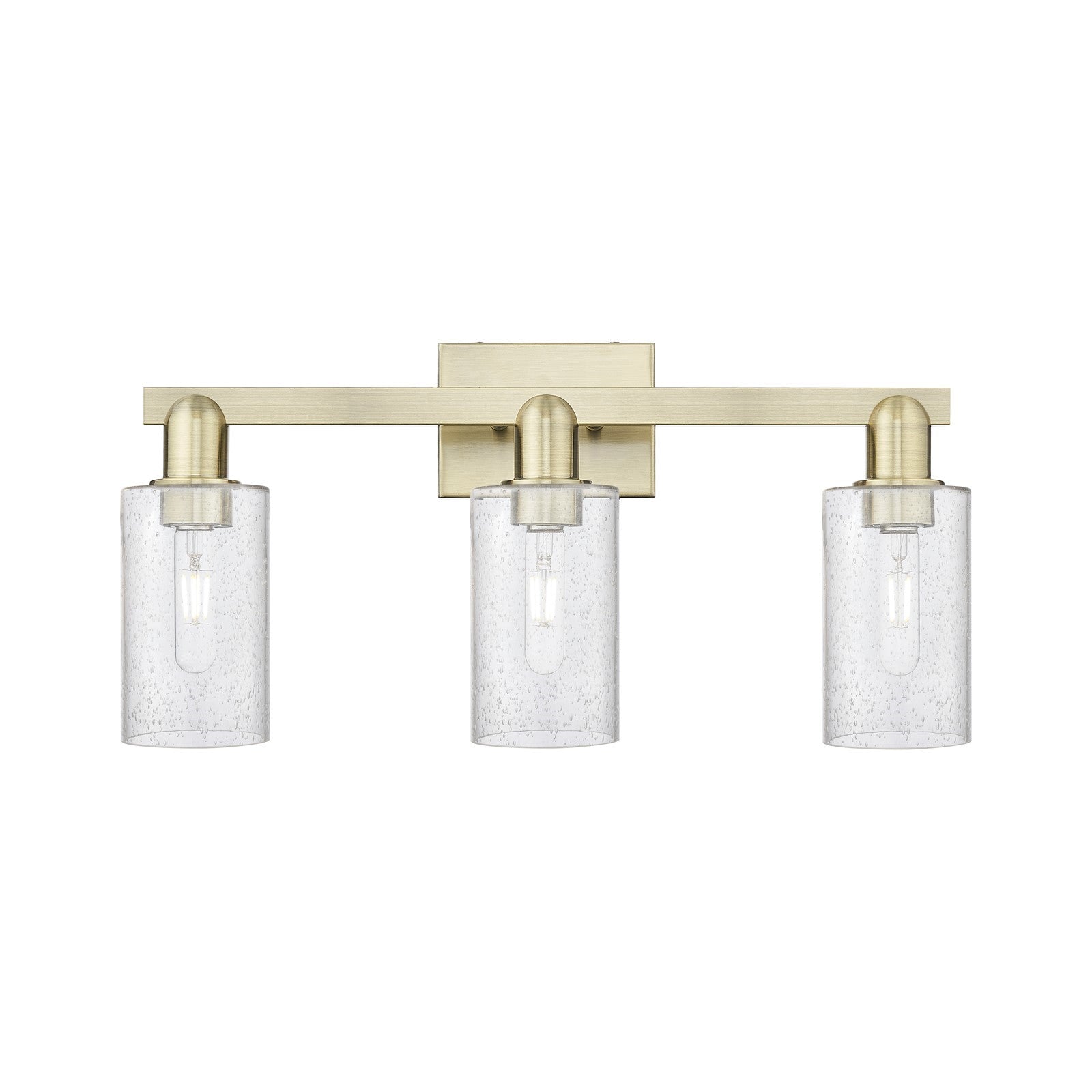 Innovations Clymer 23in 3-Light Bath Vanity Light | Industrial Antique Brass Steel and Seedy Glass | Bathroom Vanity | 22.88 x | Model 716-3W-AB-G804
