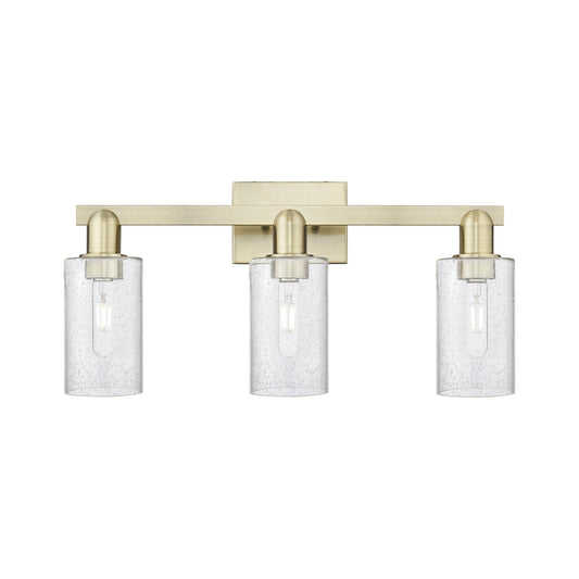 Innovations Clymer 23in 3-Light Bath Vanity Light | Industrial Antique Brass Steel and Seedy Glass | Bathroom Vanity | 22.88 x | Model 716-3W-AB-G804