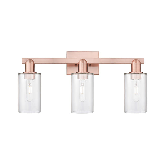 Innovations Clymer 23in 3-Light Bath Vanity Light | Industrial Antique Copper Steel and Clear Glass | Bathroom Vanity & Powder Room | Model 716-3W-AC-G802