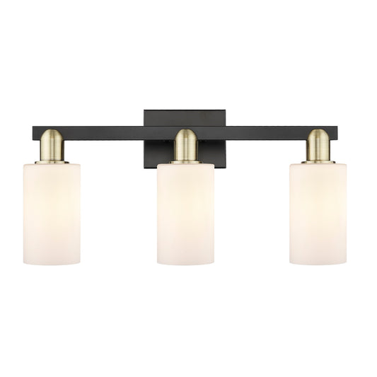 Innovations Clymer 23in 3-Light Bath Vanity | Industrial Black Antique Brass and Matte White Glass | Bathroom Vanity Light | 22.88 | Model 716-3W-BAB-G801