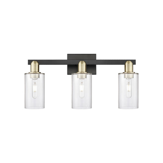 Innovations Clymer 23in 3-Light Bath Vanity | Industrial Black Antique Brass and Clear Glass | Bathroom Vanity Light | 22.88 x | Model 716-3W-BAB-G802