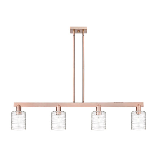 Innovations Cobbleskill 48in 4-Light Island Light | Industrial Antique Copper Steel and Deco Swirl Clear Glass | Kitchen Island | Model 716-4I-AC-G1113