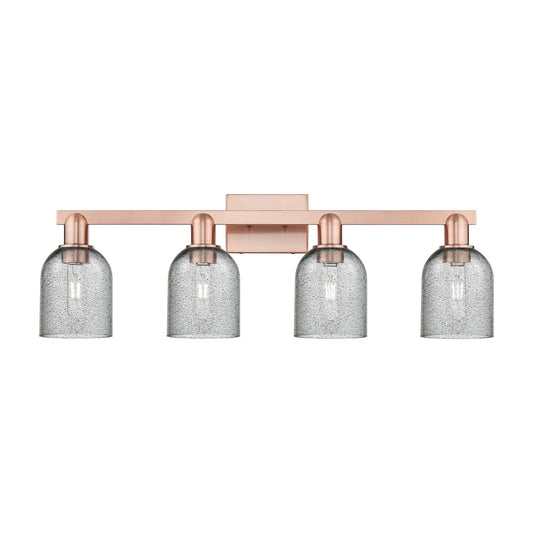 Innovations Caledonia 32in 4-Light Bath Vanity Light | Industrial Antique Copper Steel and Charcoal Glass | Bathroom Vanity | Model 716-4W-AC-G257