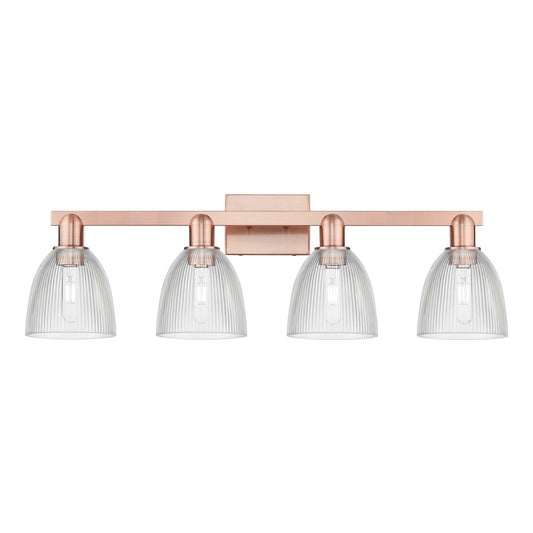 Innovations Castile 33in 4-Light Bath Vanity Light | Industrial Antique Copper and Clear Glass | Damp Rated Bathroom Vanity | Model 716-4W-AC-G382