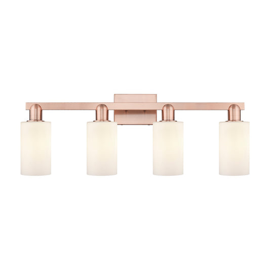 Innovations Clymer 31in 4-Light Bath Vanity Light | Industrial Antique Copper and Matte White Glass | Bathroom Vanity | Model 716-4W-AC-G801
