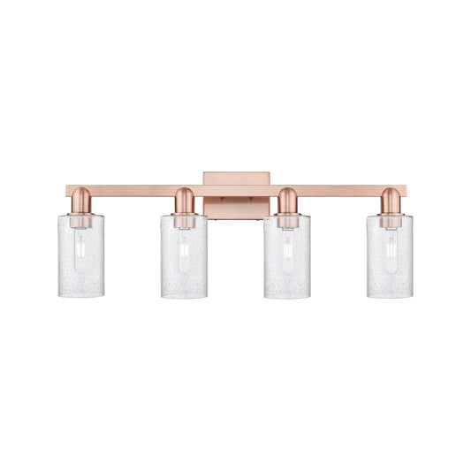 Innovations Clymer 31in 4-Light Bath Vanity Light | Industrial Antique Copper Steel and Seedy Glass | Bathroom Vanity | Model 716-4W-AC-G804