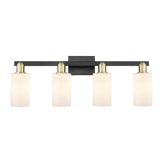 Innovations Clymer 31in 4-Light Bath Vanity | Industrial Black Antique Brass Steel and Matte White Glass | Bathroom Vanity Light | Model 716-4W-BAB-G801