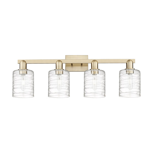 Innovations Cobbleskill 32in 4-Light Bath Vanity Light | Industrial Champagne Bronze Steel and Deco Swirl Clear Glass | Bathroom | Model 716-4W-CB-G1113
