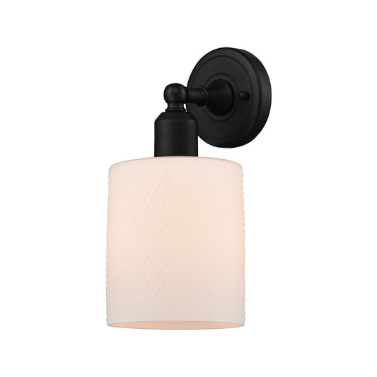 Innovations Cobbleskill 5in 1-Light Wall Sconce | Industrial Matte Black Steel and Matte White Glass | Bedroom & Hallway Accent | Model 900-1W-BK-G111