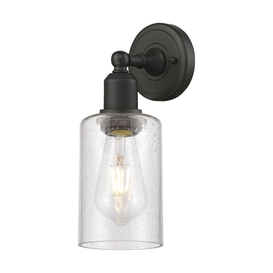 Innovations Clymer 1-Light 4in Wall Sconce | Industrial Oil Rubbed Bronze Steel and Seedy Glass | Bathroom & Hallway Accent Light | Model 900-1W-OB-G804
